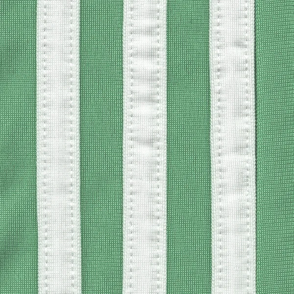 Green textile texture,white ribbons — Stock Photo, Image