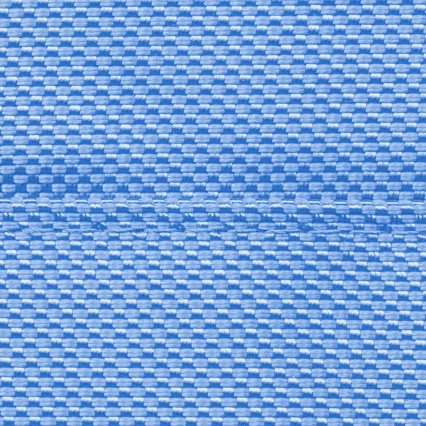 Blauwe synthetische materiaal textuur close-up — Stockfoto