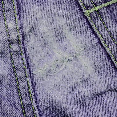 detail of torn violet denim clipart