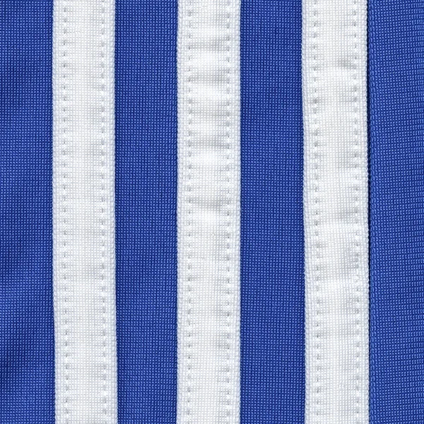 Blue textile texture,white ribbons — Stock Photo, Image