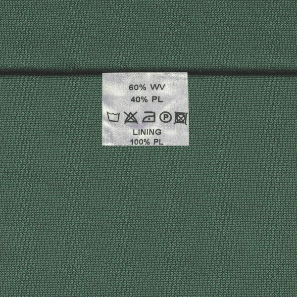 Zelený textilní textura, značka, velikost — Stock fotografie