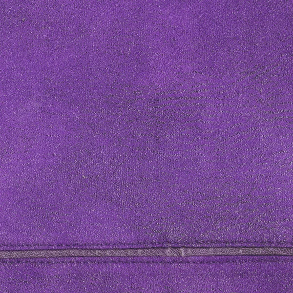 Violet gelooid leder texture als achtergrond, naad — Stockfoto