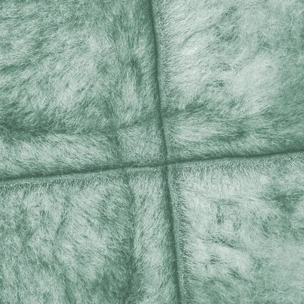 Natuurlijke bont textuur geschilderd groen, naden — Stockfoto