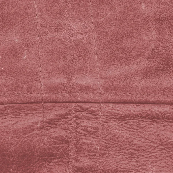 Textura de couro vermelho velho, desgastado e riscado close-up — Fotografia de Stock
