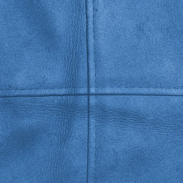 Blue leather texture decorated with seams — Stock Photo, Image