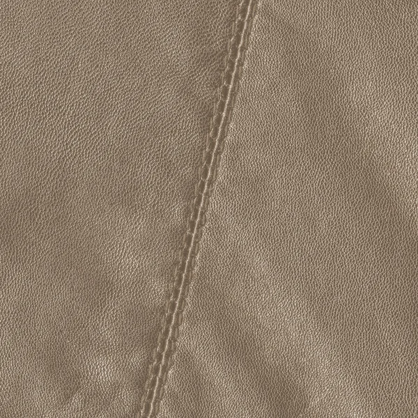 Коричневый кожаный фон, шов — стоковое фото