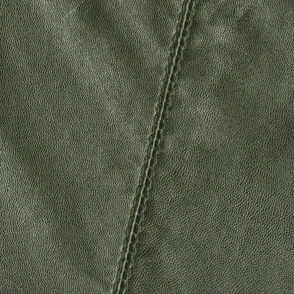 Green leather background,seam — Stock Photo, Image