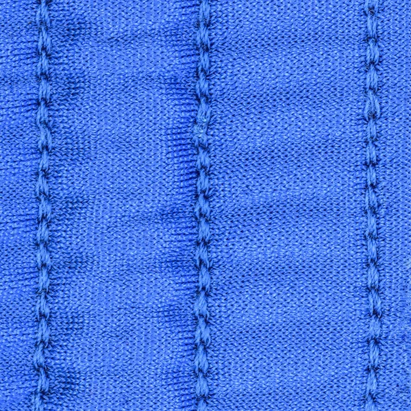 Modrý textilní textur zdobené švy — Stock fotografie