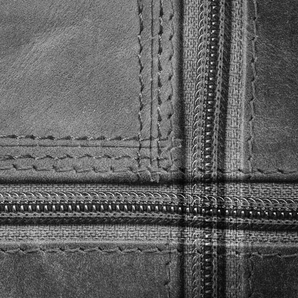 Fond gris à base de fragment de sac en cuir — Photo