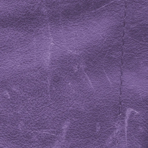 Старый и изношенный фиолетовый кожаный фон, старый шов — стоковое фото