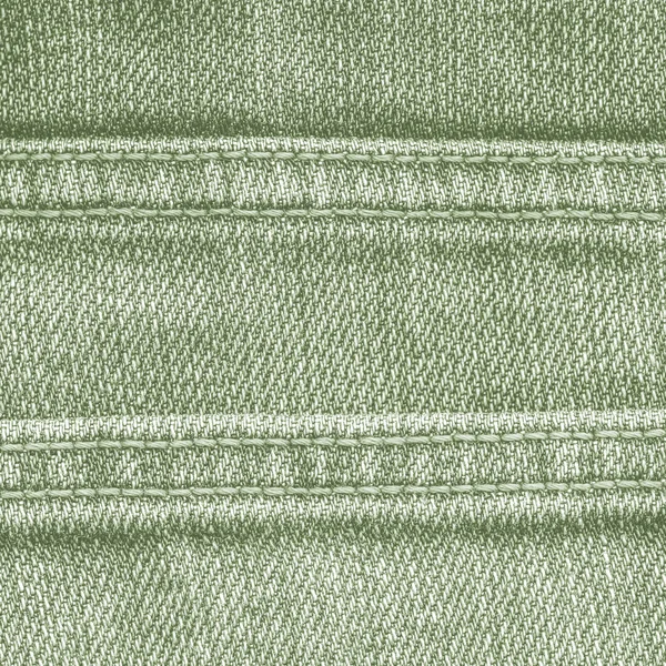 Textura jeans verde decorado com costuras — Fotografia de Stock