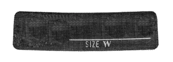 Etichetta tessile nera isolata su sfondo bianco — Foto Stock