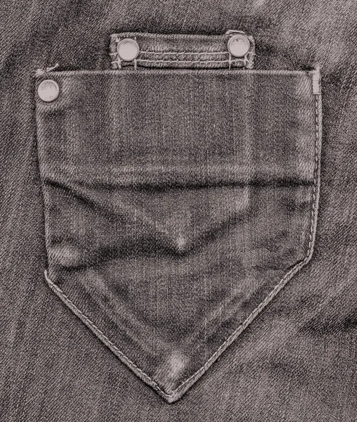 Braune Jeans Tasche auf Jeans Hintergrund — Stockfoto