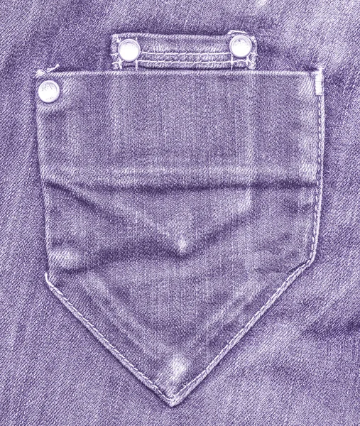 Poche jeans violet sur fond de jeans — Photo