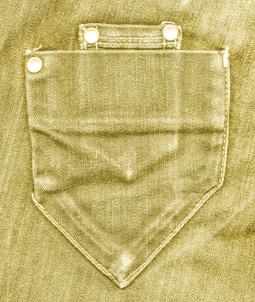 Bolso de jeans amarelo no fundo de jeans — Fotografia de Stock