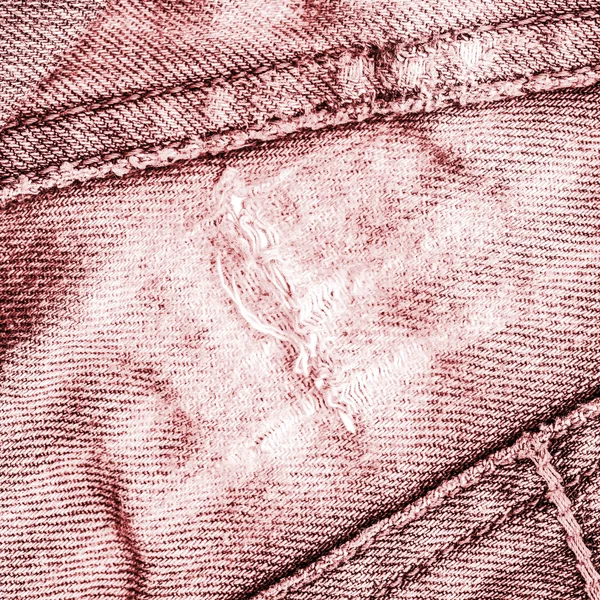 Detail van gescheurde rode jeans — Stockfoto