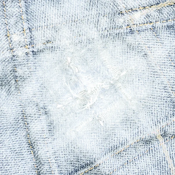 Velho rasgado azul denim textura como fundo — Fotografia de Stock