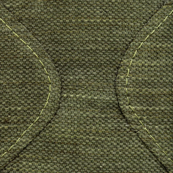 Πράσινο κλωστοϋφαντουργικών υφή διακοσμημένα με ραφές — Φωτογραφία Αρχείου