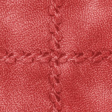 kırmızı deri doku dikişleri ile dekore edilmiştir.