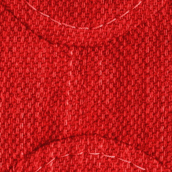 縫い目で飾られた赤い繊維テクスチャ — ストック写真