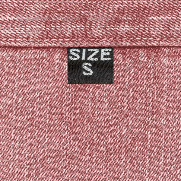 Red jeans texture,seam, tag — Stock Photo, Image