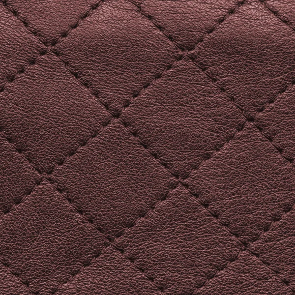Röd-brun läder texture, sömmar — Stockfoto