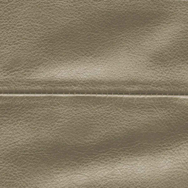 Brown leather texture decorated with seam — Stock Photo, Image