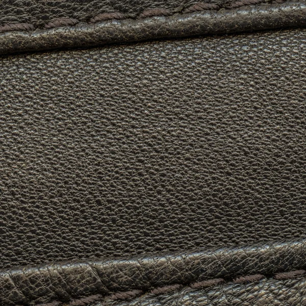 Texture cuir marron foncé décorée de coutures — Photo