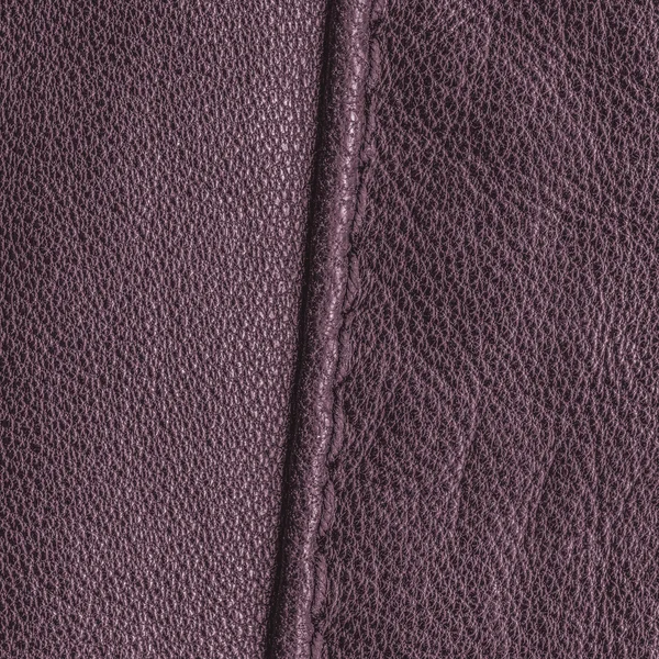 Cherry leather texture decorated with seam — Stock Photo, Image