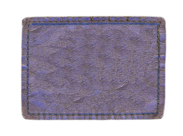Etiqueta de couro violeta em branco isolado no branco — Fotografia de Stock