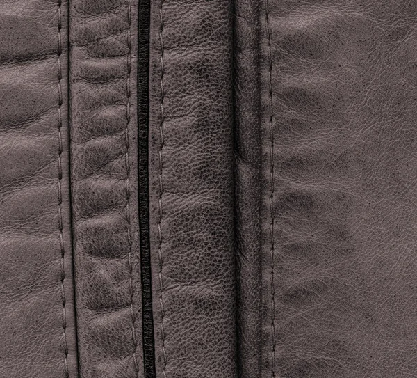 Dark brown leather background, seams — Stock Photo, Image