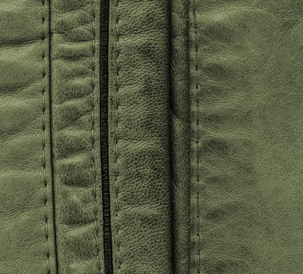 Fundo de couro verde escuro, costuras — Fotografia de Stock