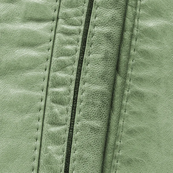 Zelené kožené pozadí, švy — Stock fotografie