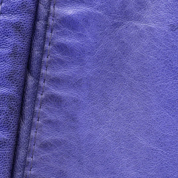 Blauwe leder texture versierd met naad — Stockfoto