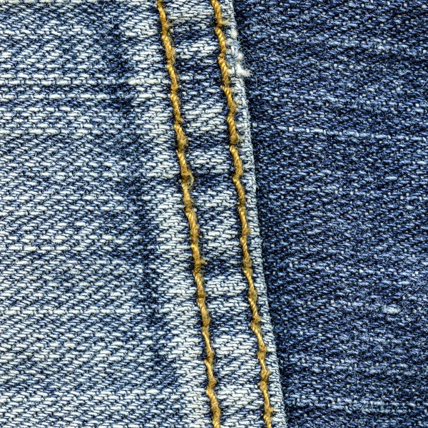 Blue Jeans Hintergrund mit Nähten verziert — Stockfoto