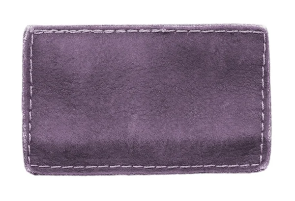 Rótulo de couro violeta no fundo branco — Fotografia de Stock