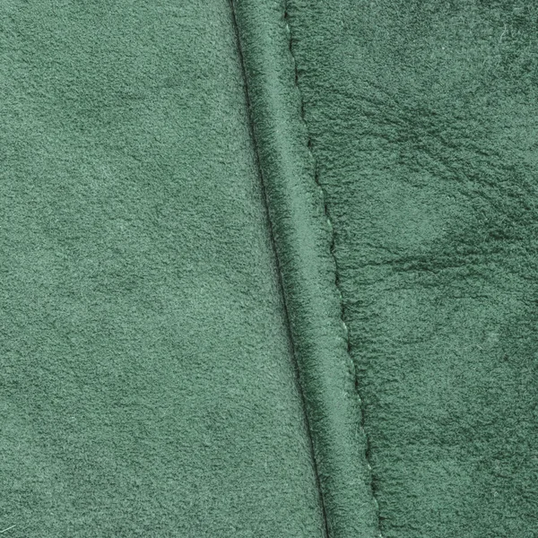 Zielony skórzany tekstura zbliżenie, szew — Zdjęcie stockowe