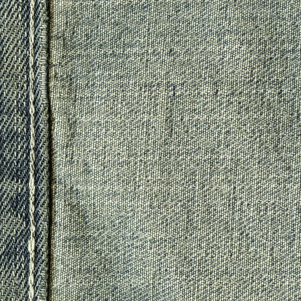 Texture of old blue jeans wrong side, seam — Stock Photo, Image