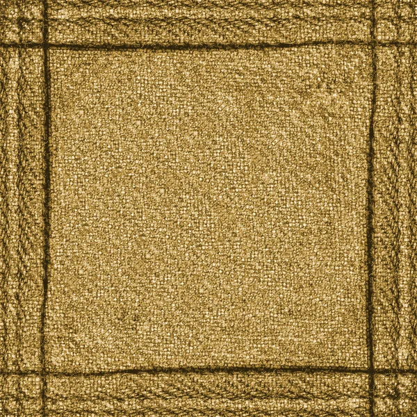 Gul-brun jeans bakgrund, sömmar — Stockfoto