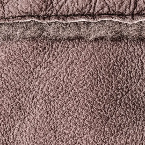 Fond de cuir brun avec couture gros plan — Photo