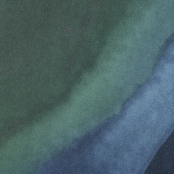Groen-blauw textiel achtergrond. Stockfoto