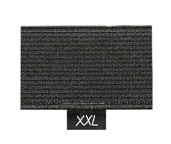 Etiqueta têxtil preta sobre fundo branco, tamanho — Fotografia de Stock