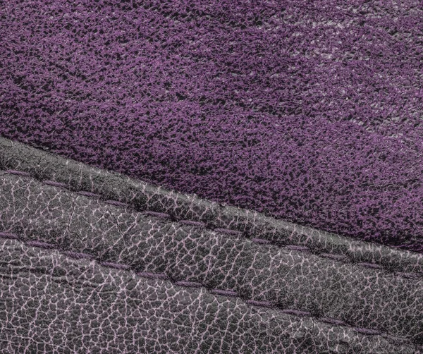 Fondo violeta de dos tipos de cuero, costuras — Foto de Stock