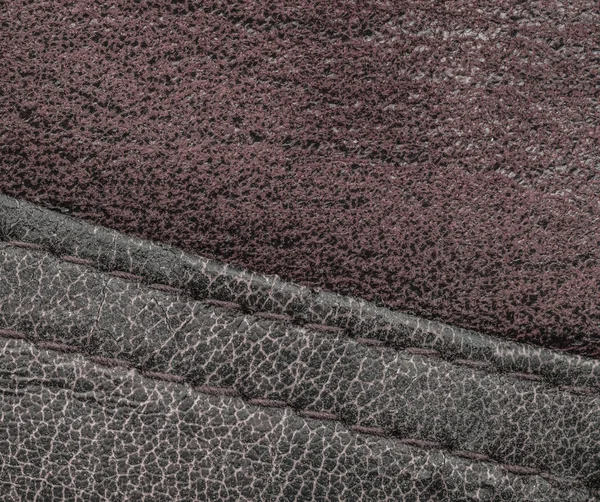 Background of pieces of  leather sewn together — Stock Photo, Image