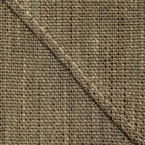 Brown tweed texture, seam.stitches — Stock Photo, Image