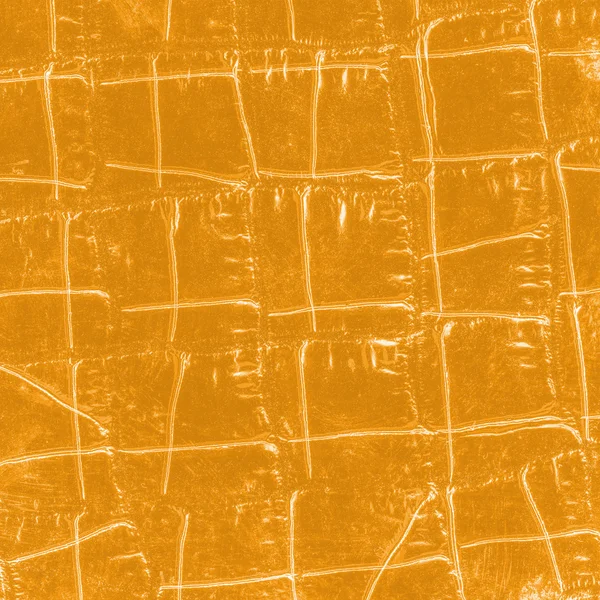 Žlutá umělé krokodýlí kůže textury pozadí — Stock fotografie
