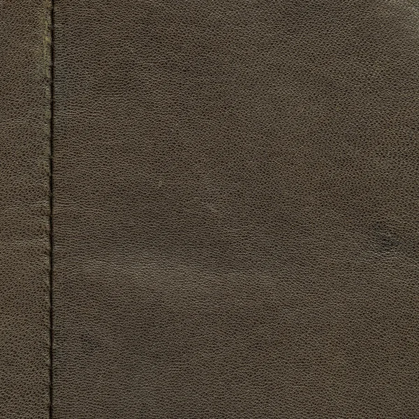 Old brown leather background with seam — Stock Photo, Image