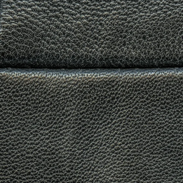 Textura de couro preto close-up, costura — Fotografia de Stock