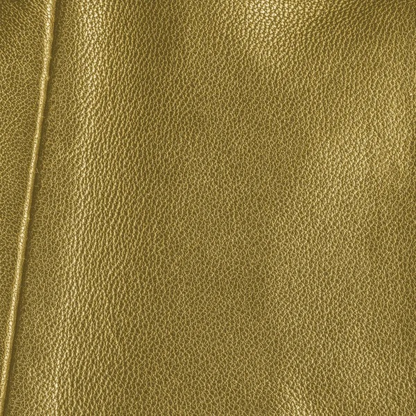 Yellow leather texture decorated with seam — Stock Photo, Image