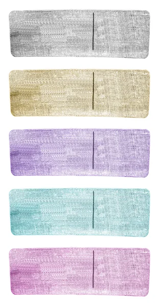 Set of blank tags of different colors for denim garment — Stock Photo, Image